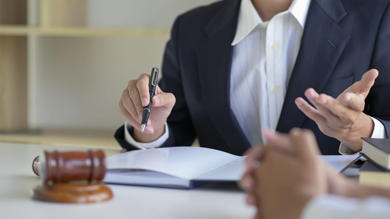 Cropped shot of Lawyers give advice to clients in the law office